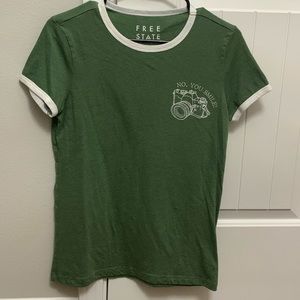 green camera tee
